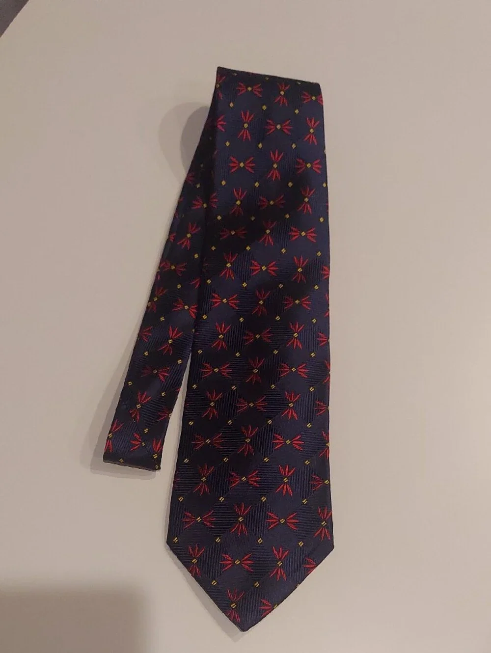 Vintage Geoffrey Beene Silk Navy Tie with Red Floral Pattern and Yellow Accents